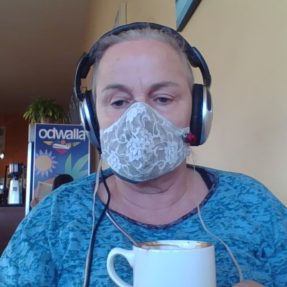 Suki Graves working mask in coffee shop