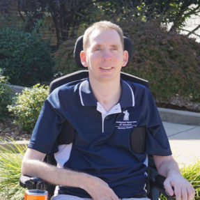 Chad Buder seated in his wheelchair